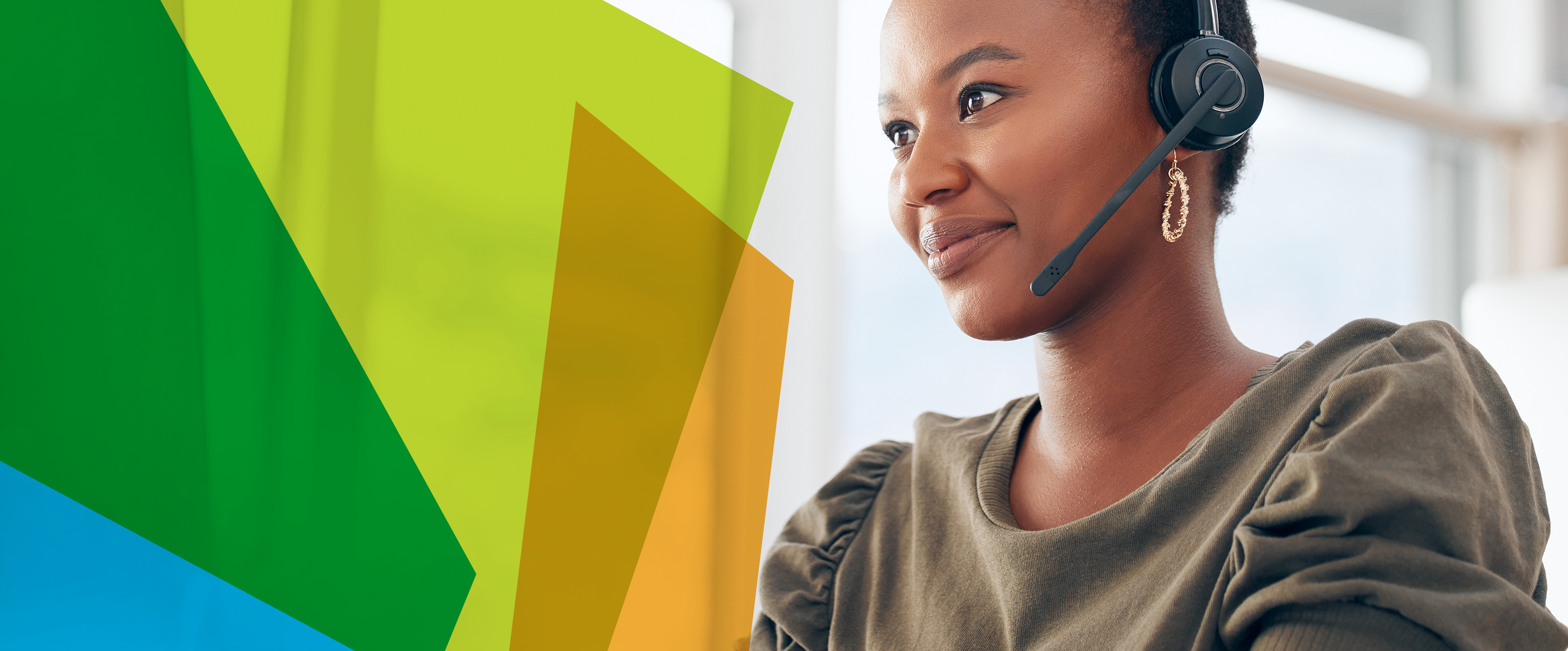 Photograph of a young woman of colour wearing a headset