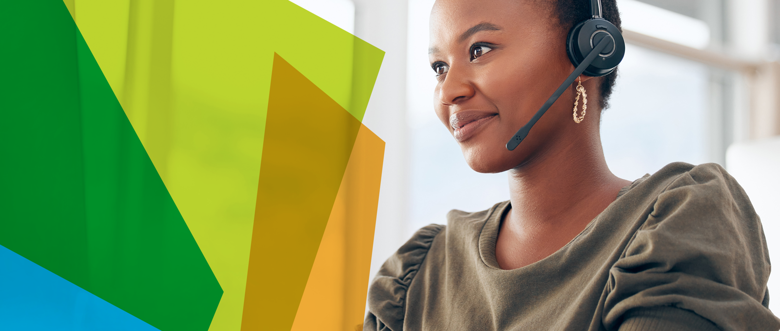 Photograph of a young woman of colour wearing a headset