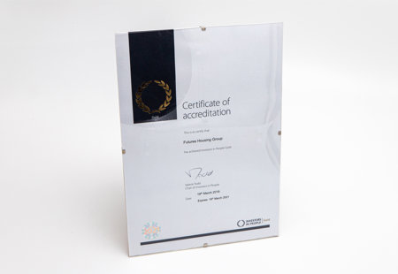 Photograph of the certificate confirming Futures' IiP Platinum status