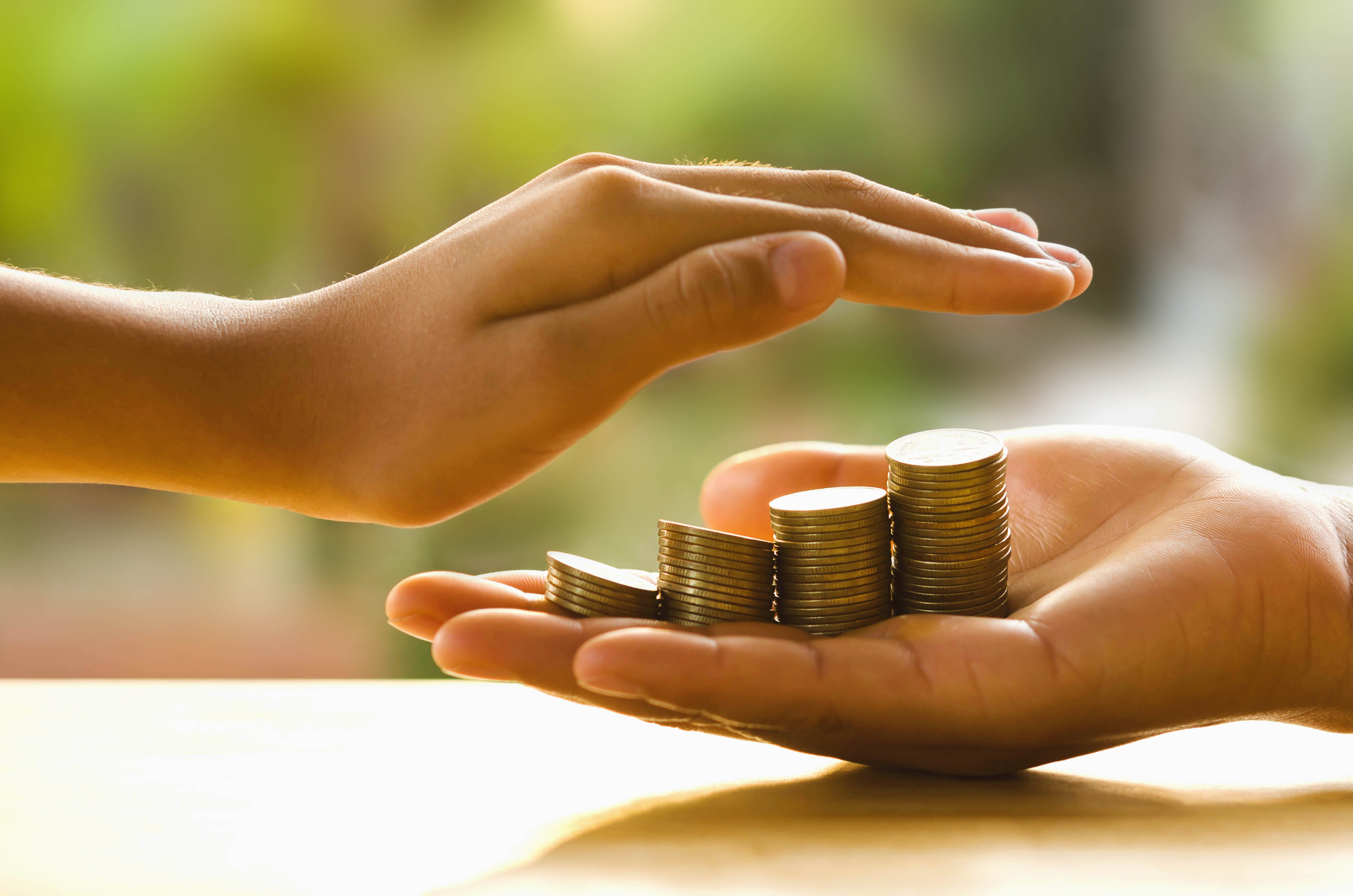 Hand Protect Money Save Money Concept