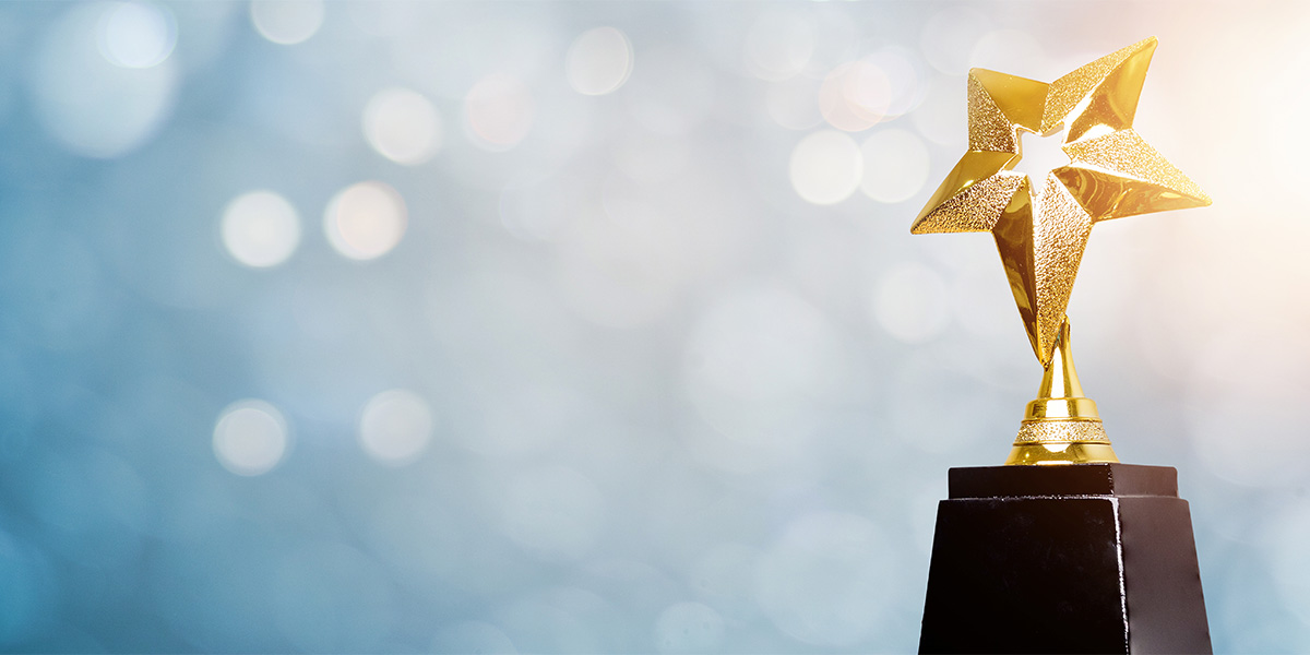 Gold Star Trophy With A Blue Background