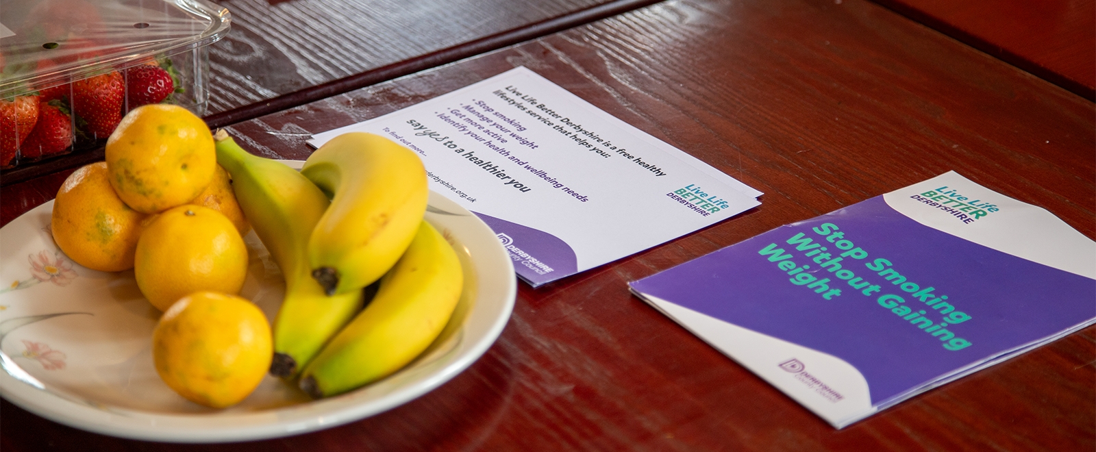 Live Life Better Derbyshire Leaflets On Table With Fruit